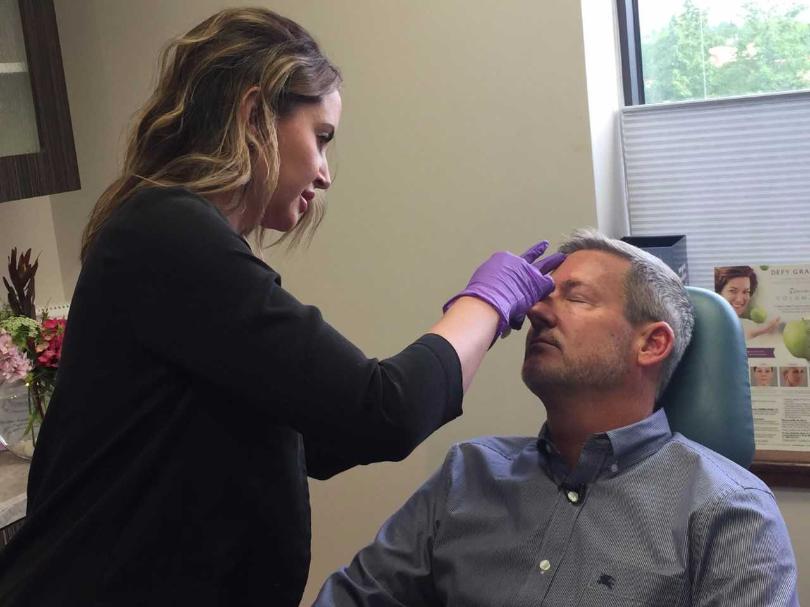 man receiving botox treatment.