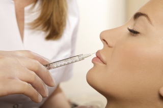 nurse administering restylane injection - restylane in englewood, NJ concept