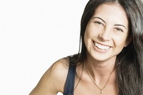 woman smiling after botox treatment.