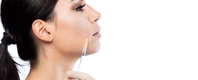 woman getting facial fillers - facial fillers in englewood concept